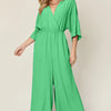 Double Take Full Size Surplice Wide Leg Jumpsuit with Pockets - Mid Green
