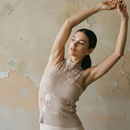 Woman wearing an active top designed for movement and everyday performance