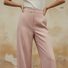 Women’s tailored pants in a soft neutral tone for everyday wear