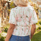 Alaiya Floral Puff Sleeve V Neck Tied Front Peplum Blouse - Farnelli