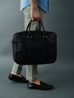 Black leather briefcase from Classy Leather Bags, featuring a sleek design and sturdy handles for professional use.