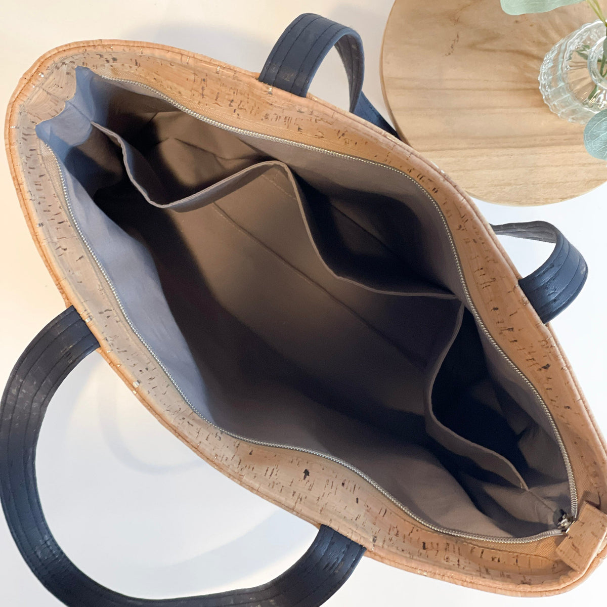 Carry Courage ADVOCATE zippered tote in coal black with structured handles and secure top zipper