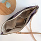 Carry Courage VISIONARY amethyst crossbody bag with adjustable strap and structured design