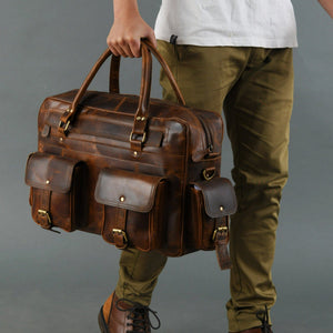 Finn handcrafted buffalo leather laptop briefcase by Classy Leather Bags, showing the textured leather surface and sturdy handles.