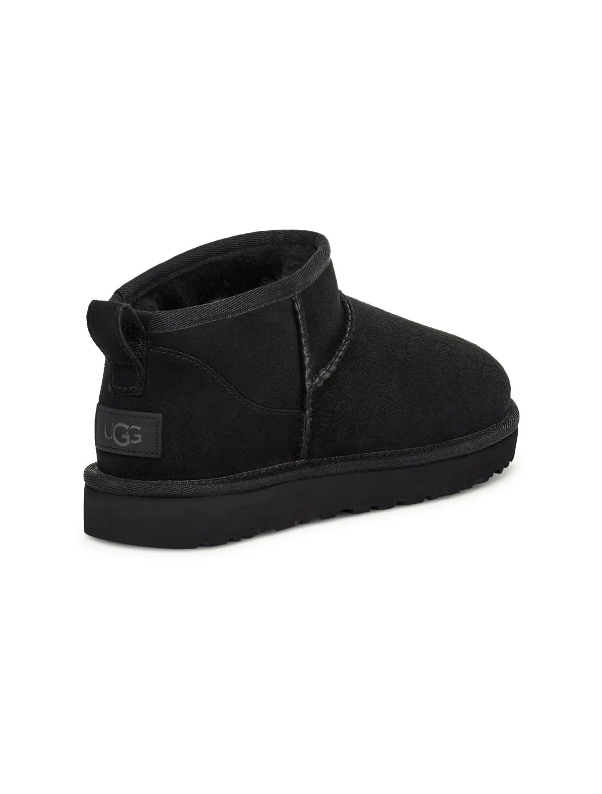 Black UGG women's Classic Ultra Mini boots, side view with low shaft and pull tabs