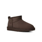 UGG Womens Classic Ultra Mini Dusted Cocoa footwear with plush sheepskin lining and suede exterior, designed for cozy winter style.