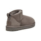 Gray UGG Women's Classic Ultra Mini boots in footwear style, showcasing soft suede material and cozy design.