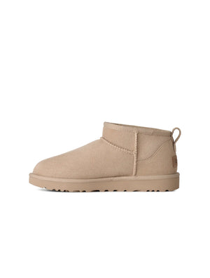 UGG Women's Classic Ultra Mini Moonlight boots in soft suede with plush lining, stylish ankle-height footwear.