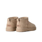 UGG Women's Classic Ultra Mini Moonlight boots, stylish denim exchange footwear with plush sheepskin lining and suede exterior.