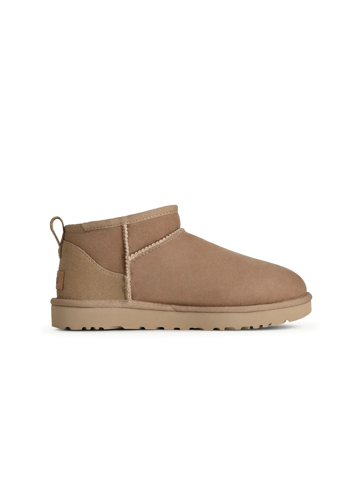 UGG Women's Classic Ultra Mini Sand sneakers with plush lining and suede exterior, stylish footwear for women.