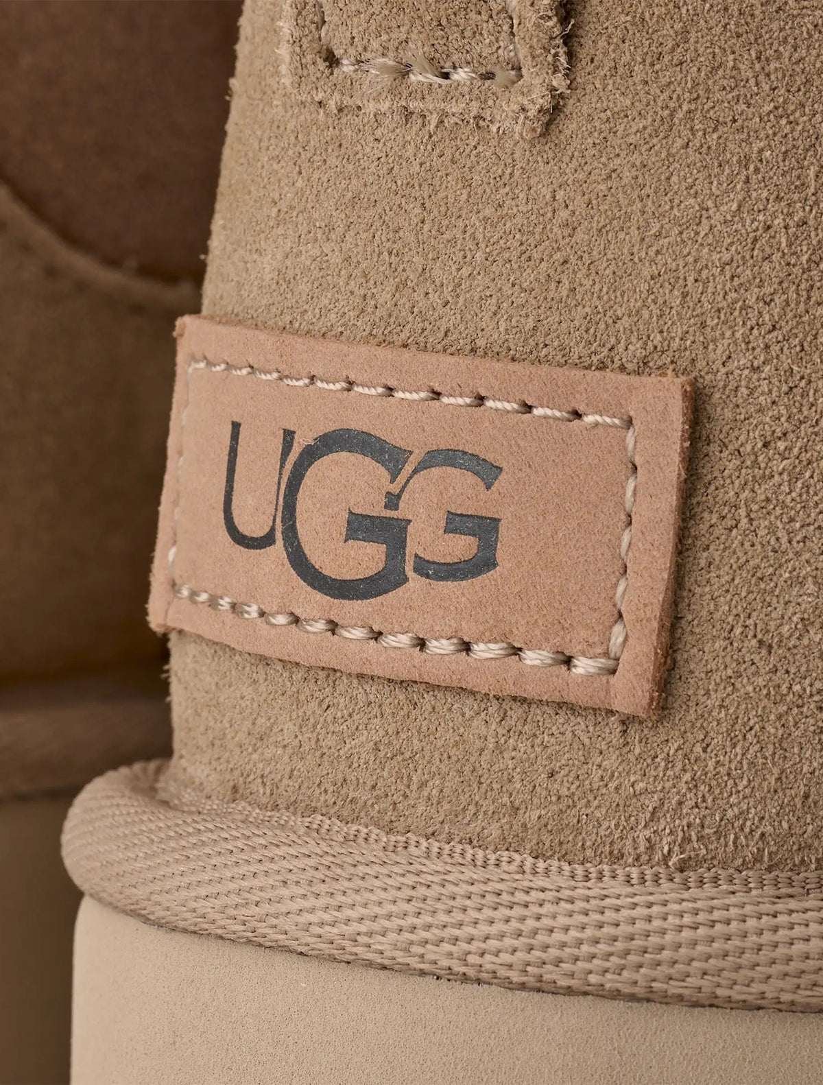 UGG Women's Classic Ultra Mini Sandal, casual footwear for women with comfortable design and neutral tan color.
