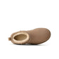 UGG Women's Classic Ultra Mini Sand-colored footwear, stylish and cozy, featuring soft sheepskin and a rugged outsole.