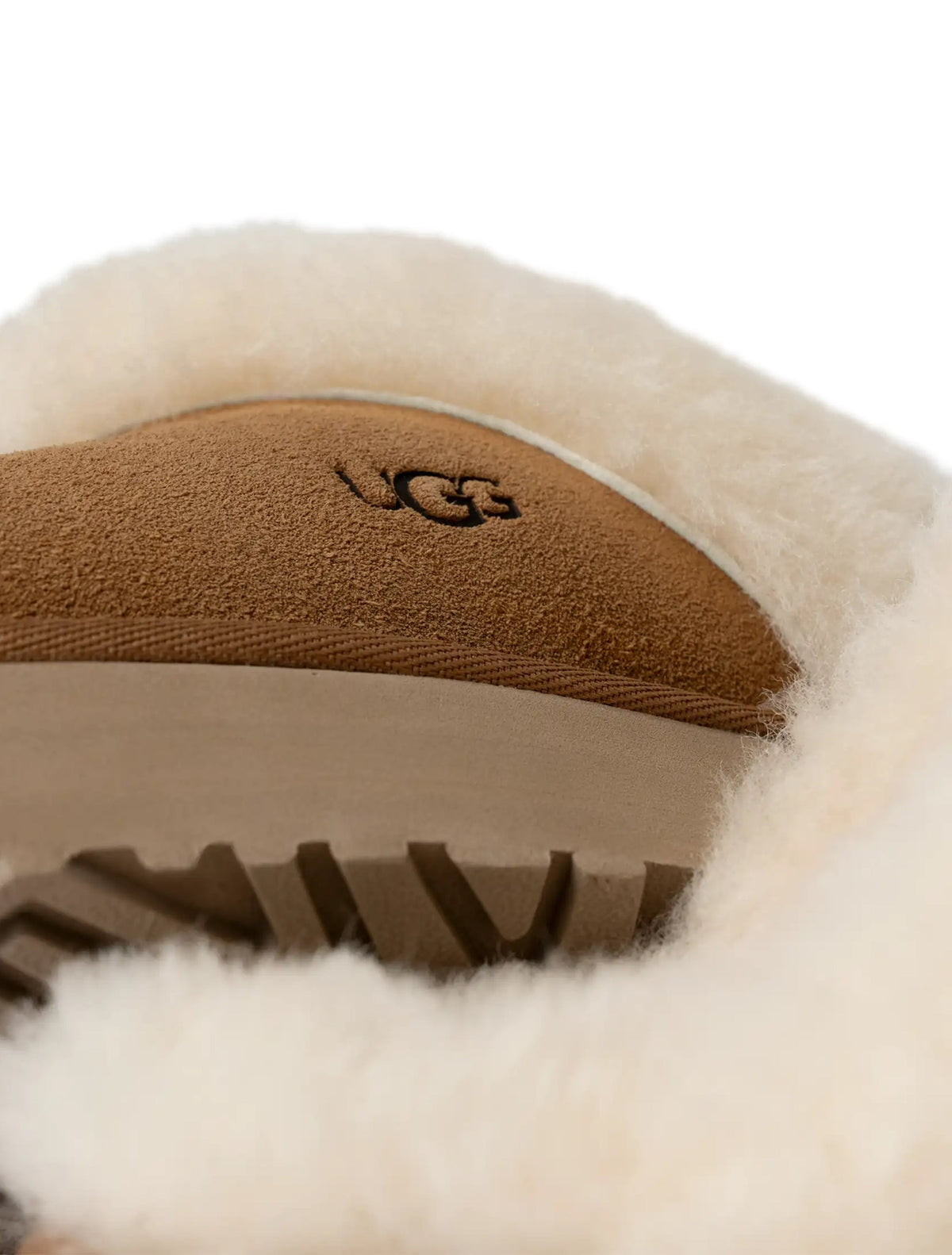 UGG Women's Disquette Chestnut leather footwear with plush lining, stylish slip-on design, on a neutral background.