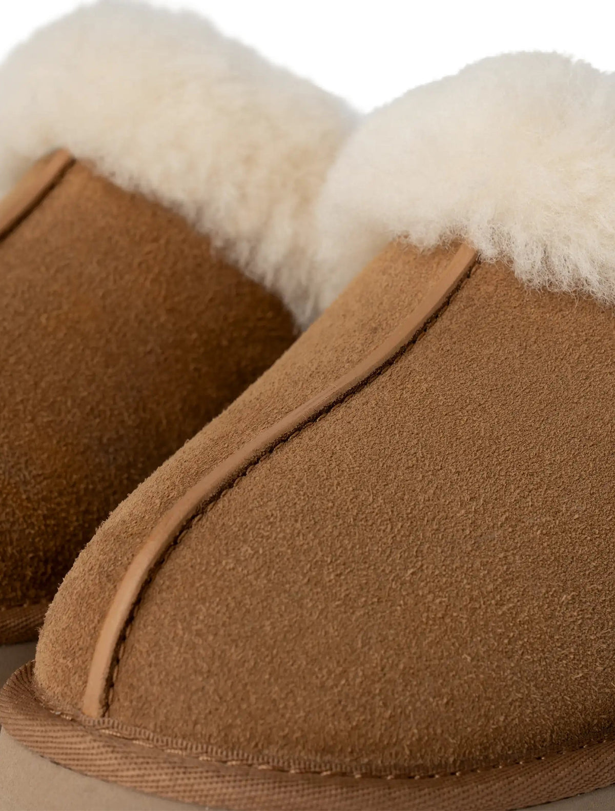 UGG Women's Disquette chestnut suede footwear with bow detail, stylish and comfortable UGG casual shoes for women.