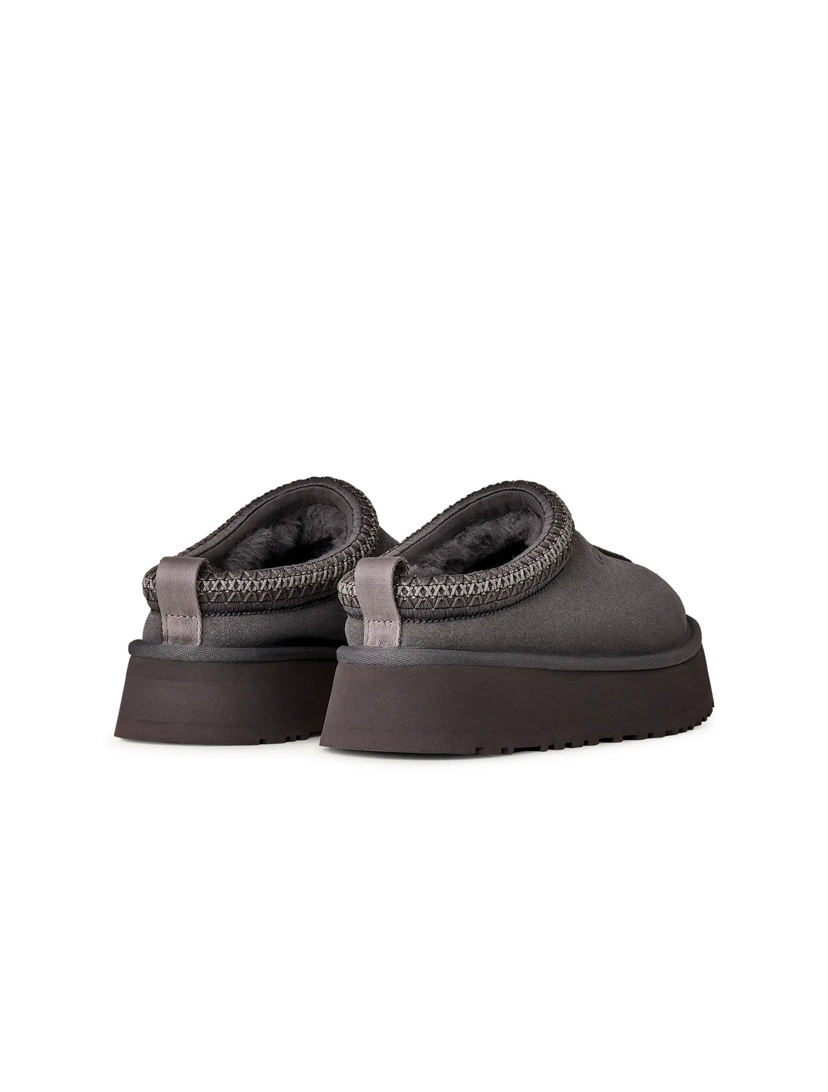 UGG Womens Tazz II Obsidian footwear, black slip-on shoes with cozy sheepskin lining, displayed on a neutral background.