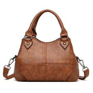 Women's retro soft leather shoulder bag by Rirati, Korean simple fashion design with a sleek, minimalist style.