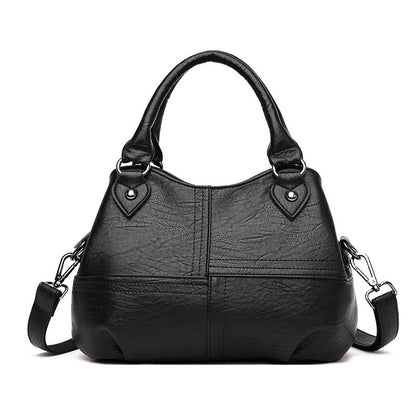 Women's retro soft leather shoulder bag by Rirati, simple fashion design with Korean-inspired style and versatile shoulder strap.