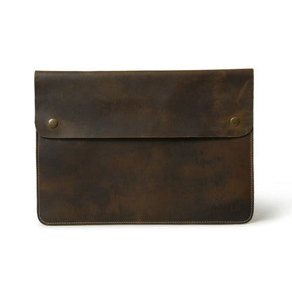 Leather MacBook Folio laptop sleeve by Classy Leather Bags, featuring a sleek, durable design with a smooth textured surface.