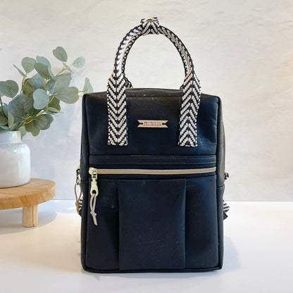 Carry Courage GAME CHANGER mini backpack in coal black, front view with compact design and adjustable straps
