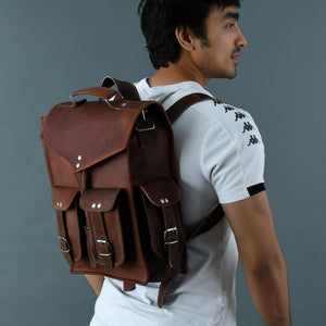Pre-Historic Convertible Backpack by Classy Leather Bags, stylish brown leather backpack with multiple compartments and adjustable straps.