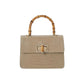 Mini Harriet handbag by thebagicon, showcasing a compact leather design with top handle and modern style.