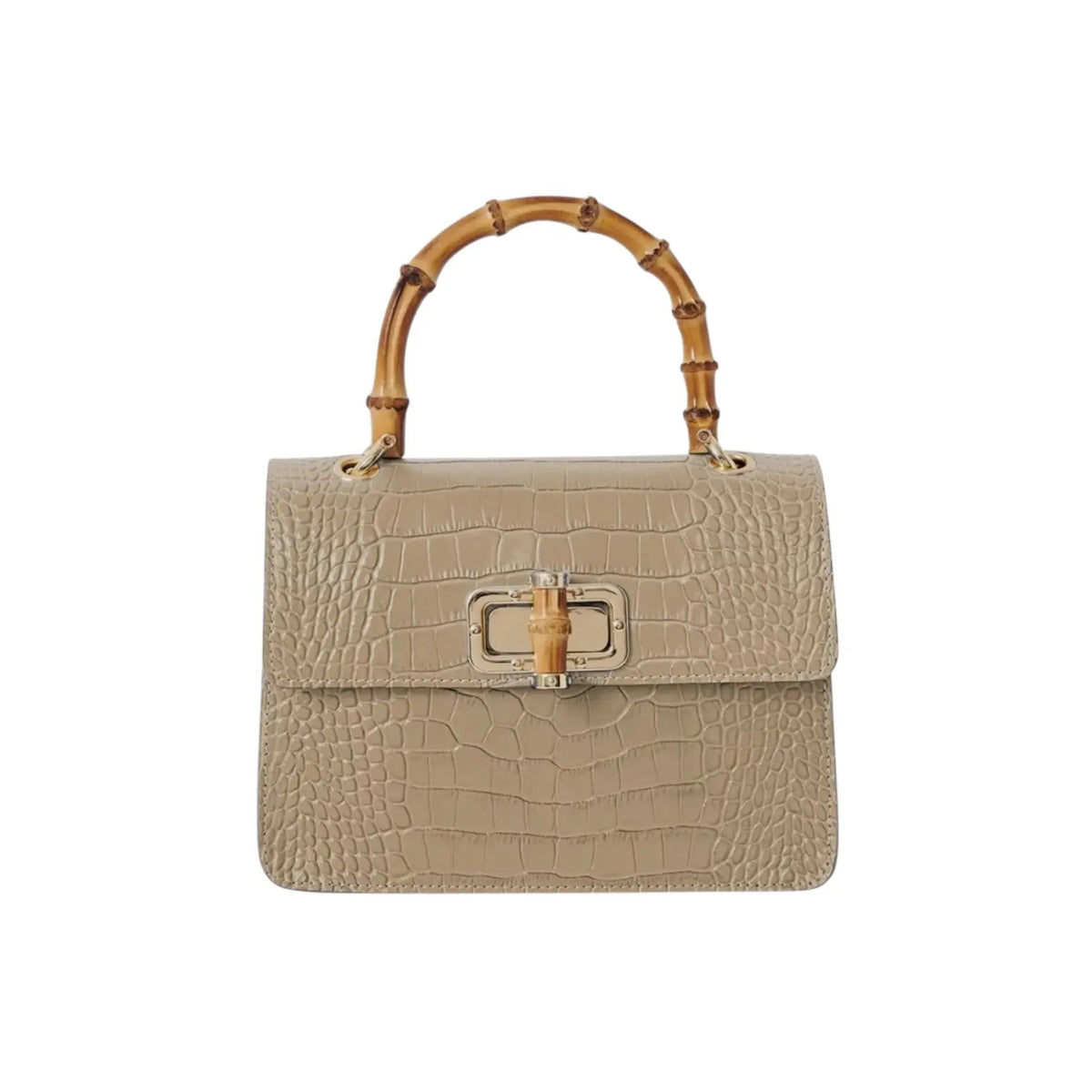 Mini Harriet handbag by thebagicon, showcasing a compact leather design with top handle and modern style.