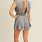 MABLE Draped Romper with Pleated Shoulder Pad Detail - Farnelli