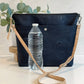 Carry Courage VISIONARY crossbody bag in coal gray with adjustable strap and compact silhouette