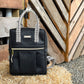 Carry Courage GAME CHANGER mini backpack in coal gray with adjustable straps and compact design