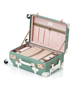 Three-piece COTRUNKAGE Riviera luggage set with matching hard-shell suitcases in a sleek design, featuring extended handles and wheels.
