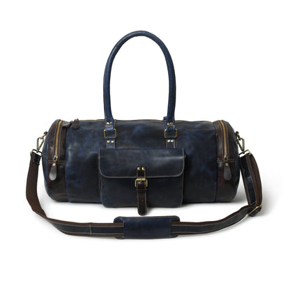 Blue premium duffle bag from Classy Leather Bags with sturdy handles and spacious interior for travel or gym use.