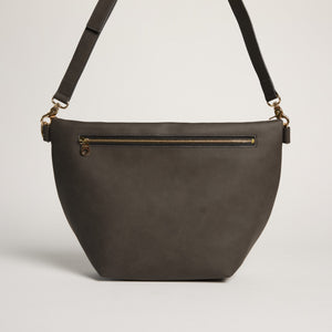 Dark grey Pineapple Hobo Fanny Bag by Allégorie featuring a casual, curved design with a pineapple logo detail.