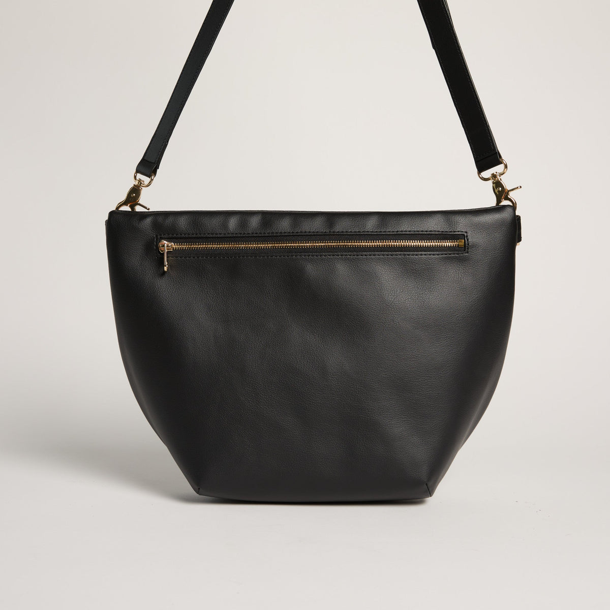 Allégorie Gala Hobo Fanny Bag in black leather, featuring a sleek design with adjustable strap and minimalist style.