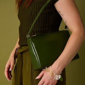 Allégorie cactus shoulder bag with green cactus design and adjustable strap, stylish accessory for casual outfits.