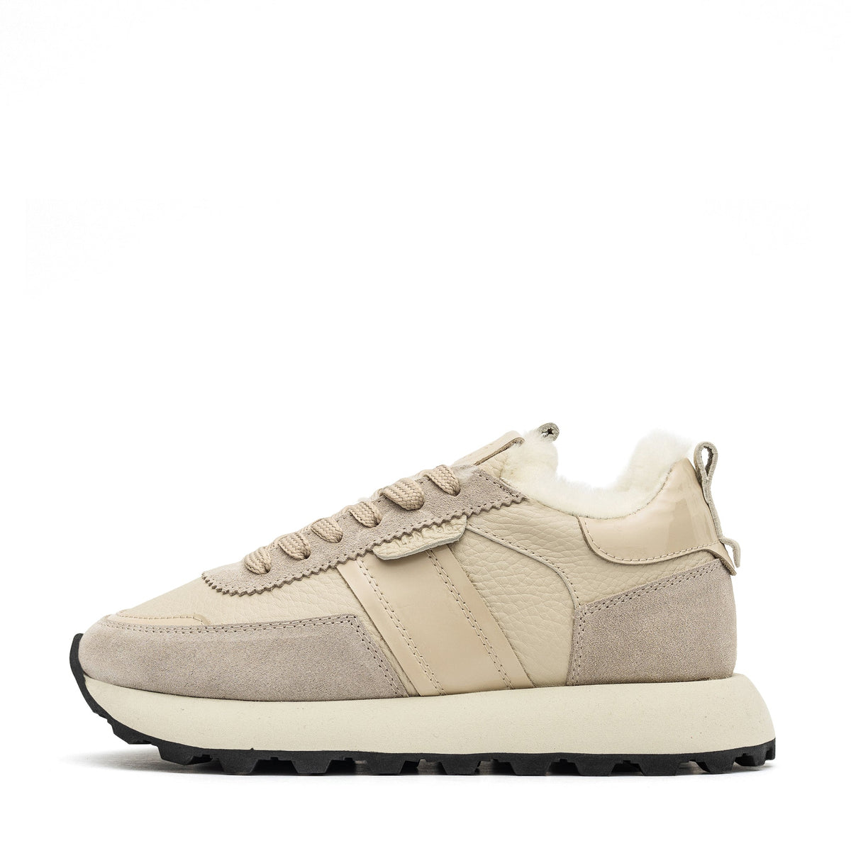 Alaska® Outerwear Company alpine shearling sneaker showing soft shearling lining and stylish sneaker design.