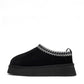 Black Alaska Shearling Slippers in boot style from Alaska Outerwear Company, featuring cozy shearling lining and durable exterior.