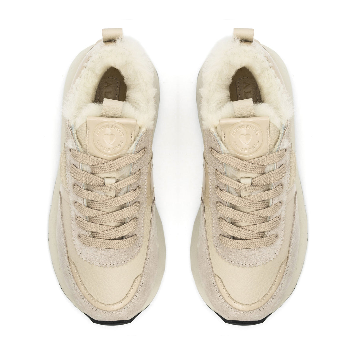 Alaska® Outerwear Company Alpine Shearling Sneaker showing the stylish shoes with shearling lining and casual design.