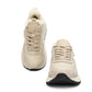 Alaska® Outerwear Company Alpine shearling sneaker showing tan suede upper, shearling lining, and rubber sole.