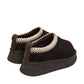 Alaska® Outerwear Company brown shearling slippers in boot style with cozy fur lining and rugged exterior.