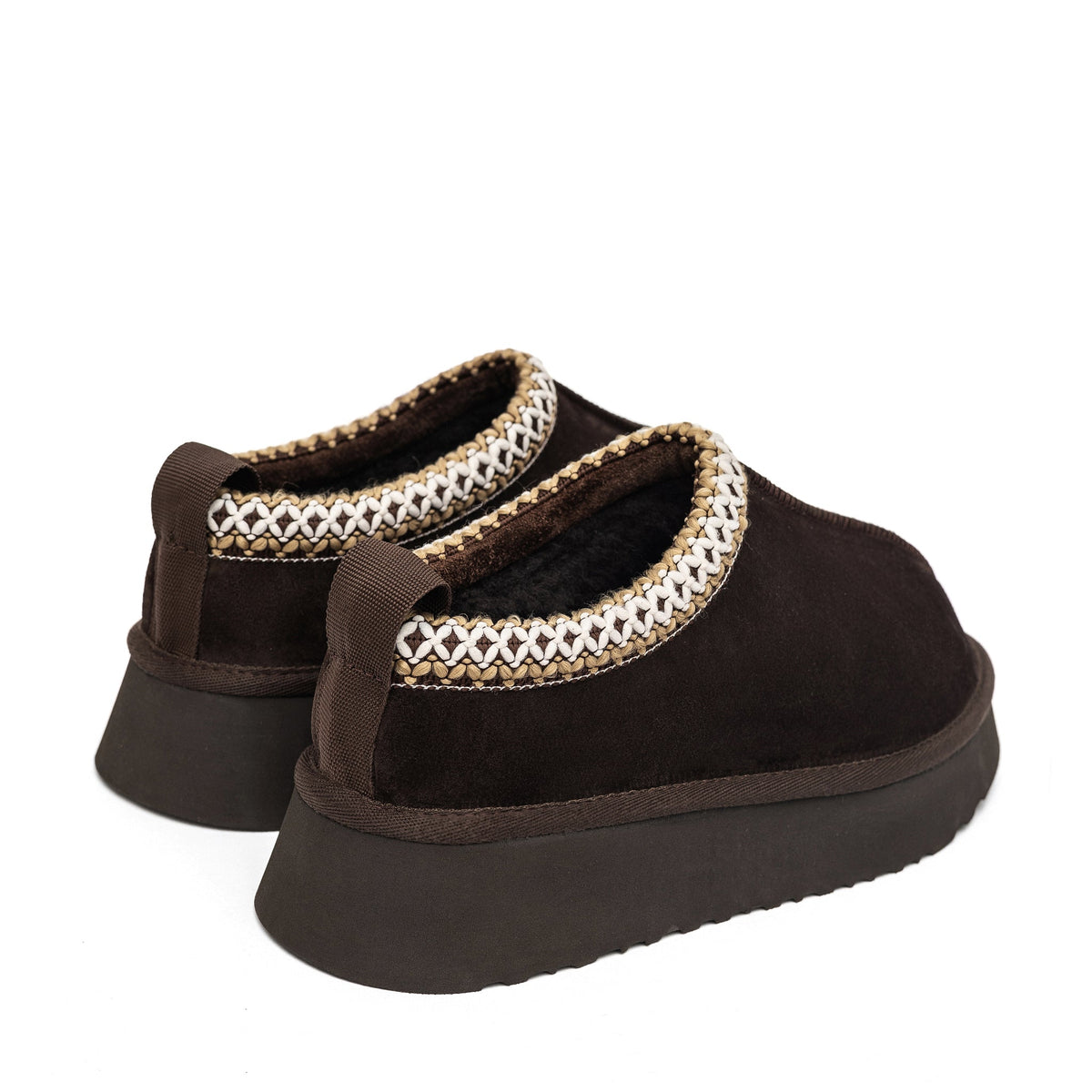 Alaska® Outerwear Company brown shearling slippers in boot style with cozy fur lining and rugged exterior.