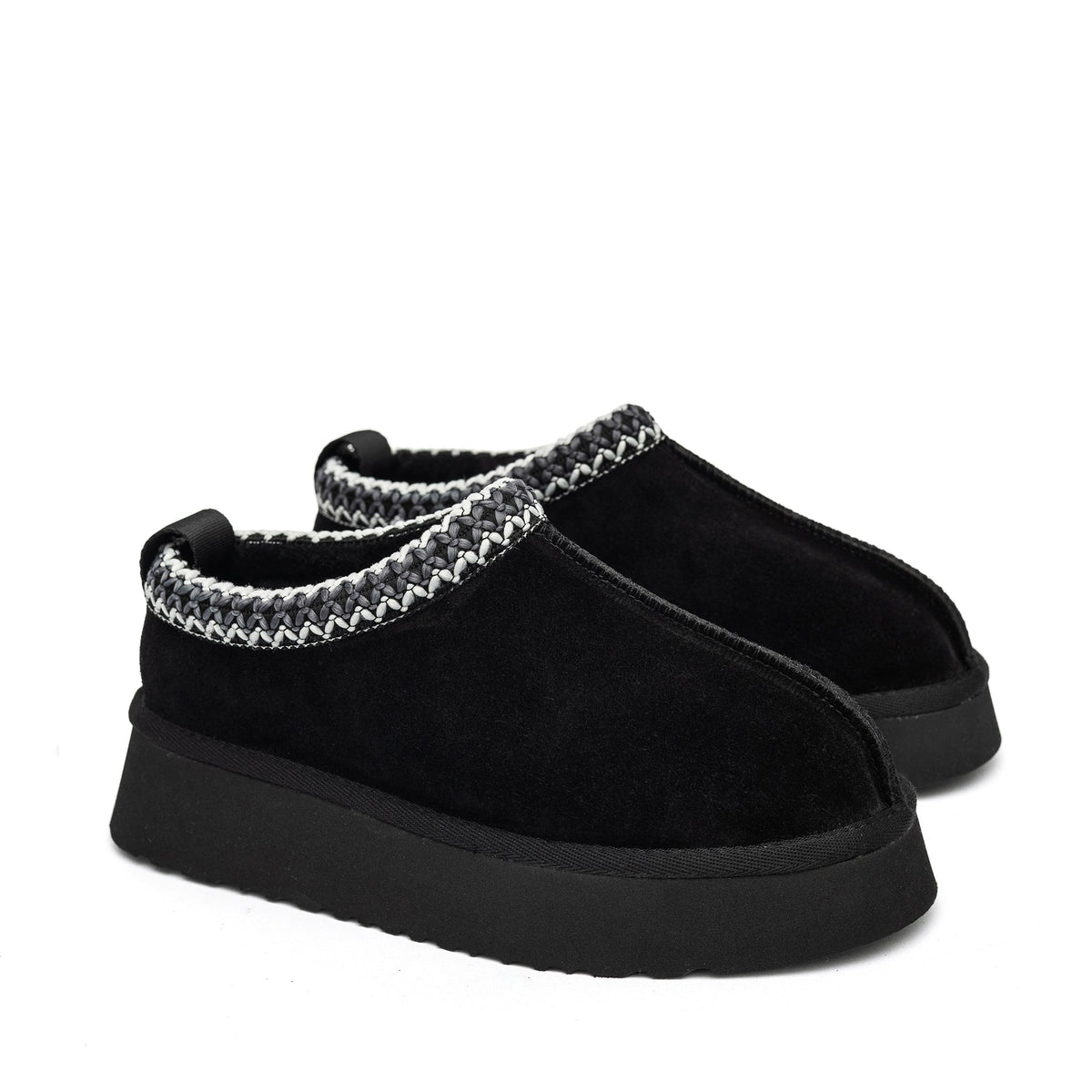 Black Alaska shearling slippers in boot style from Alaska® Outerwear Company, showing cozy shearling lining and durable outer material.
