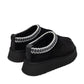 Alaska Shearling Slippers in black, cozy shearling-lined boots by Alaska® Outerwear Company, with plush interior and durable sole.