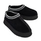 Black Alaska Shearling Slippers boots by Alaska® Outerwear Company featuring cozy shearling lining and durable sole.