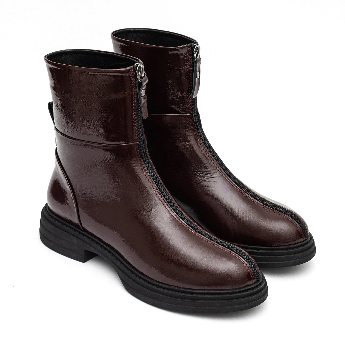 Bordeaux leather zip boots for men from Alaska® Outerwear Company, featuring stylish design and sturdy soles.