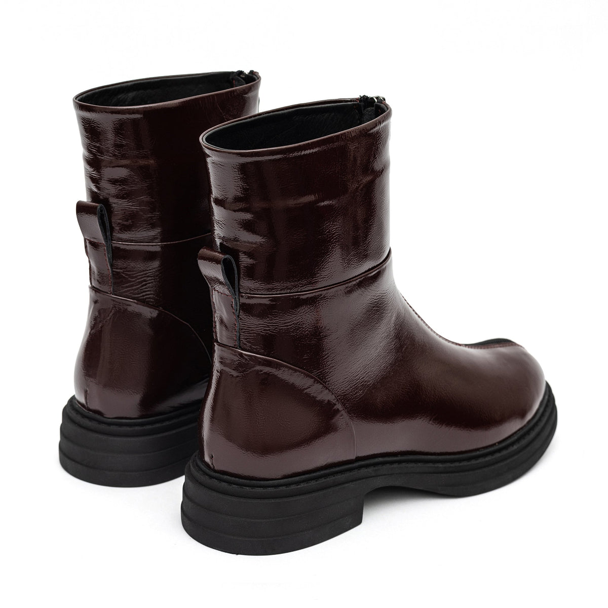 Bordeaux leather zip boots for women from Alaska® Outerwear Company, showcasing stylish ankle shoes with side zipper and leather finish.