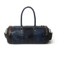 Blue premium duffle bag by Classy Leather Bags with sturdy handles and spacious interior for travel and gym use.