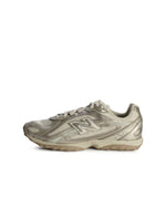 New Balance women's 204L light bronze footwear with metallic accents, showcasing stylish and comfortable sneakers for women.