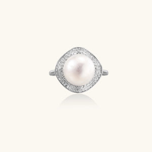 Rhodium-plated silver ring with round pearl center, double halo of baguette and round crystals forming cushion shape