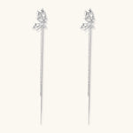 Silver-toned threader earrings featuring detailed fairy figure with wings and dual delicate chain strands, zirconia accents