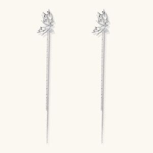 Silver-toned threader earrings featuring detailed fairy figure with wings and dual delicate chain strands, zirconia accents